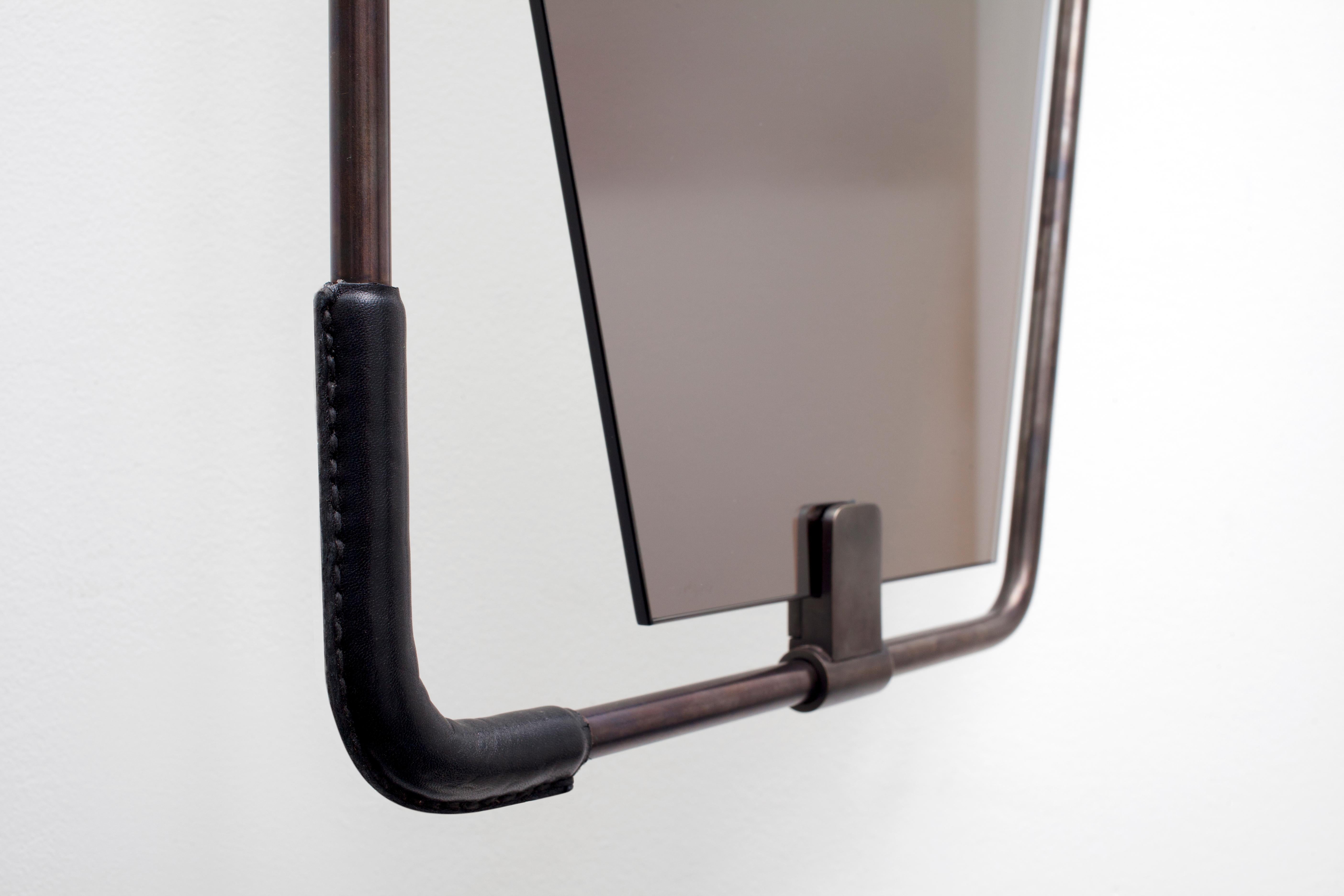 Patinated SWITCH Mirror - pivoting brass frame with leather grip For Sale