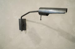 Switch One-Arm Wall Sconce - patinated brass
