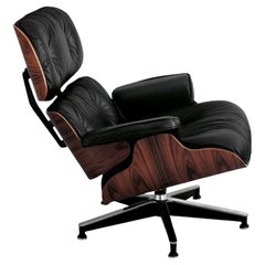 Swivel armchair in leather Alivar Mvsevm 717 - Charles and Ray Eames - Rosewood