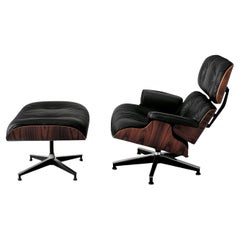 Sillón giratorio con puf en piel Alivar Mvsevm 717 - Charles and Ray Eames Sillón giratorio con puf en piel Alivar Mvsevm 717 - Charles and Ray Eames