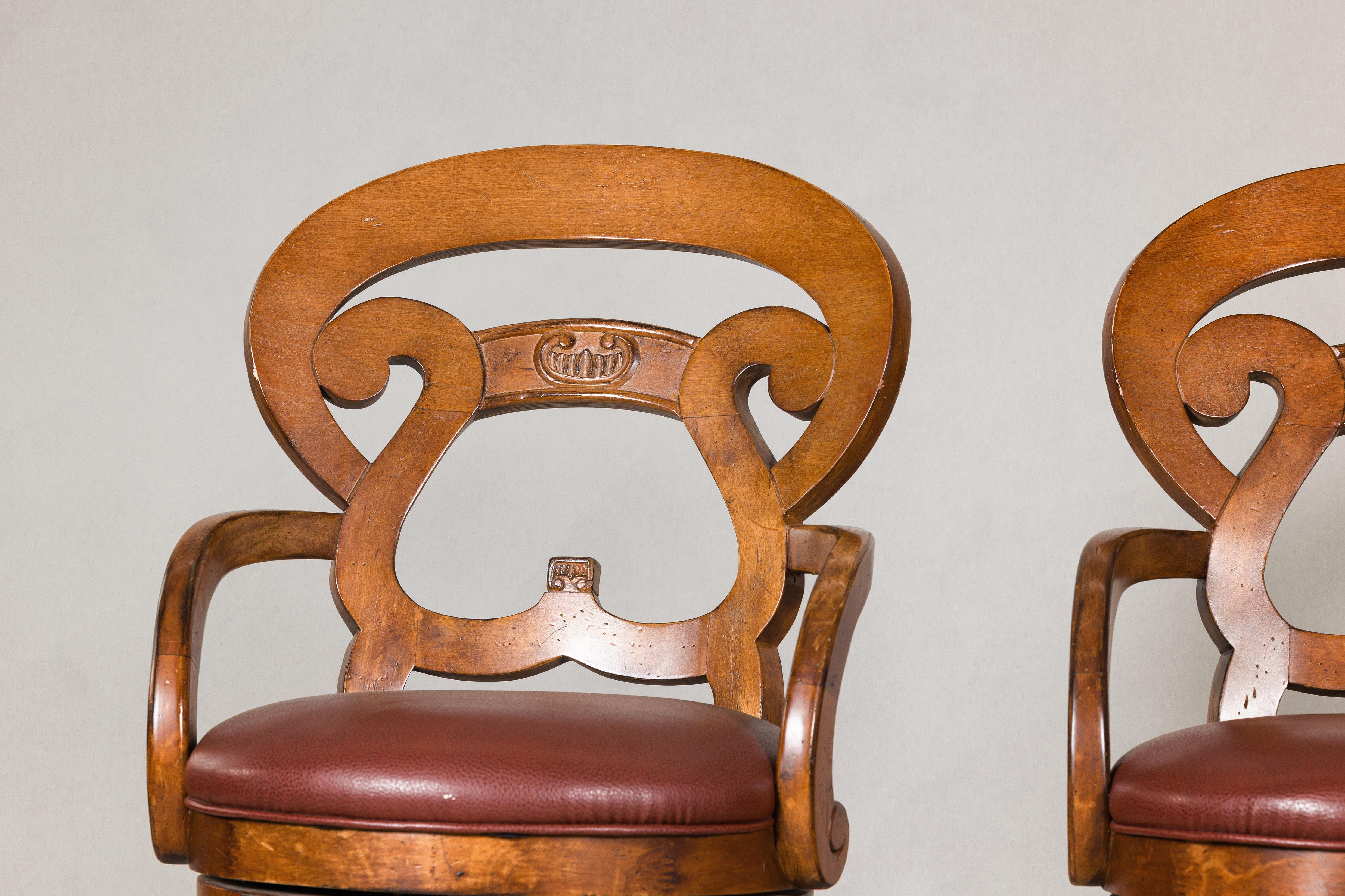 American Swivel Bar Stools with Carved Backs and Faux Leather Seats – Set of Three For Sale