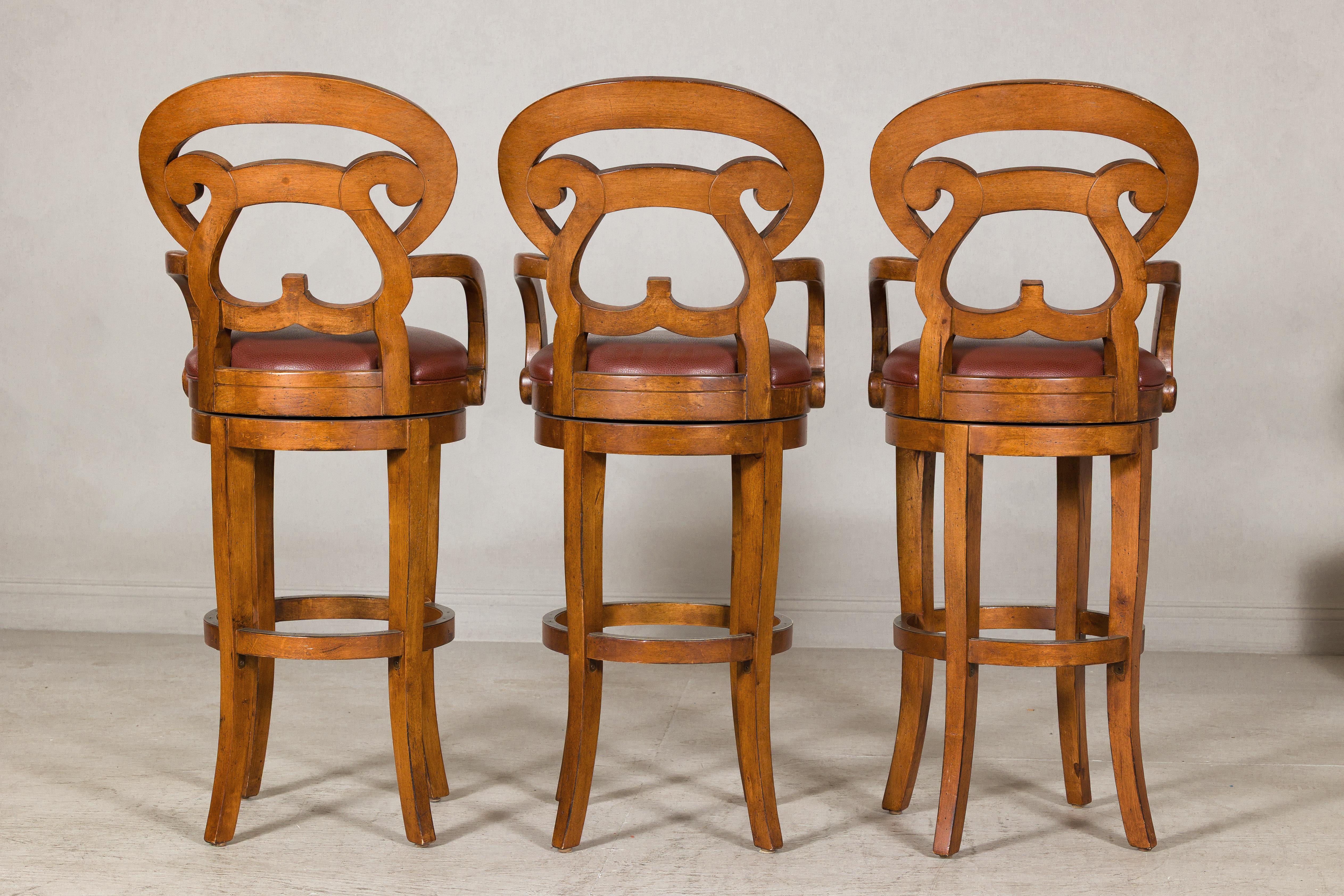 Swivel Bar Stools with Carved Backs and Faux Leather Seats – Set of Three For Sale 4