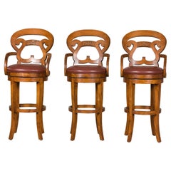 Swivel Bar Stools with Carved Backs and Faux Leather Seats – Set of Three