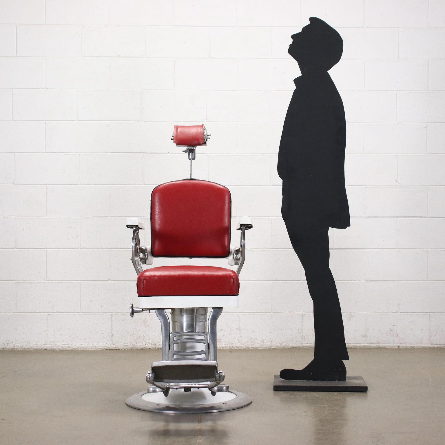 Barber chair, swivel, metal, aluminum, foam padding, skai upholstery.