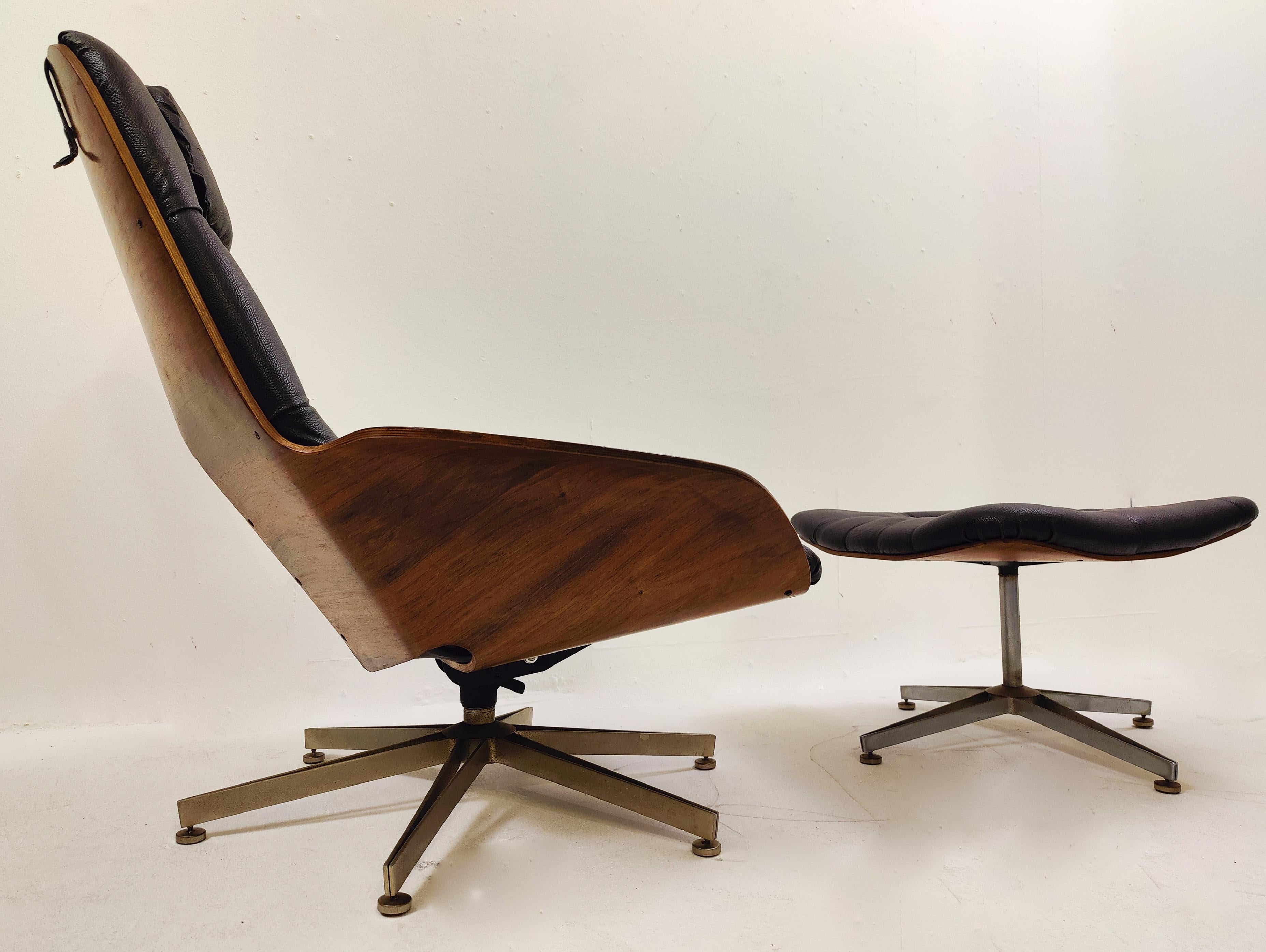 Mid-Century Modern Swivel Black Leather Armchair, Plywood Armrests and Ottoman, George Mulhauser