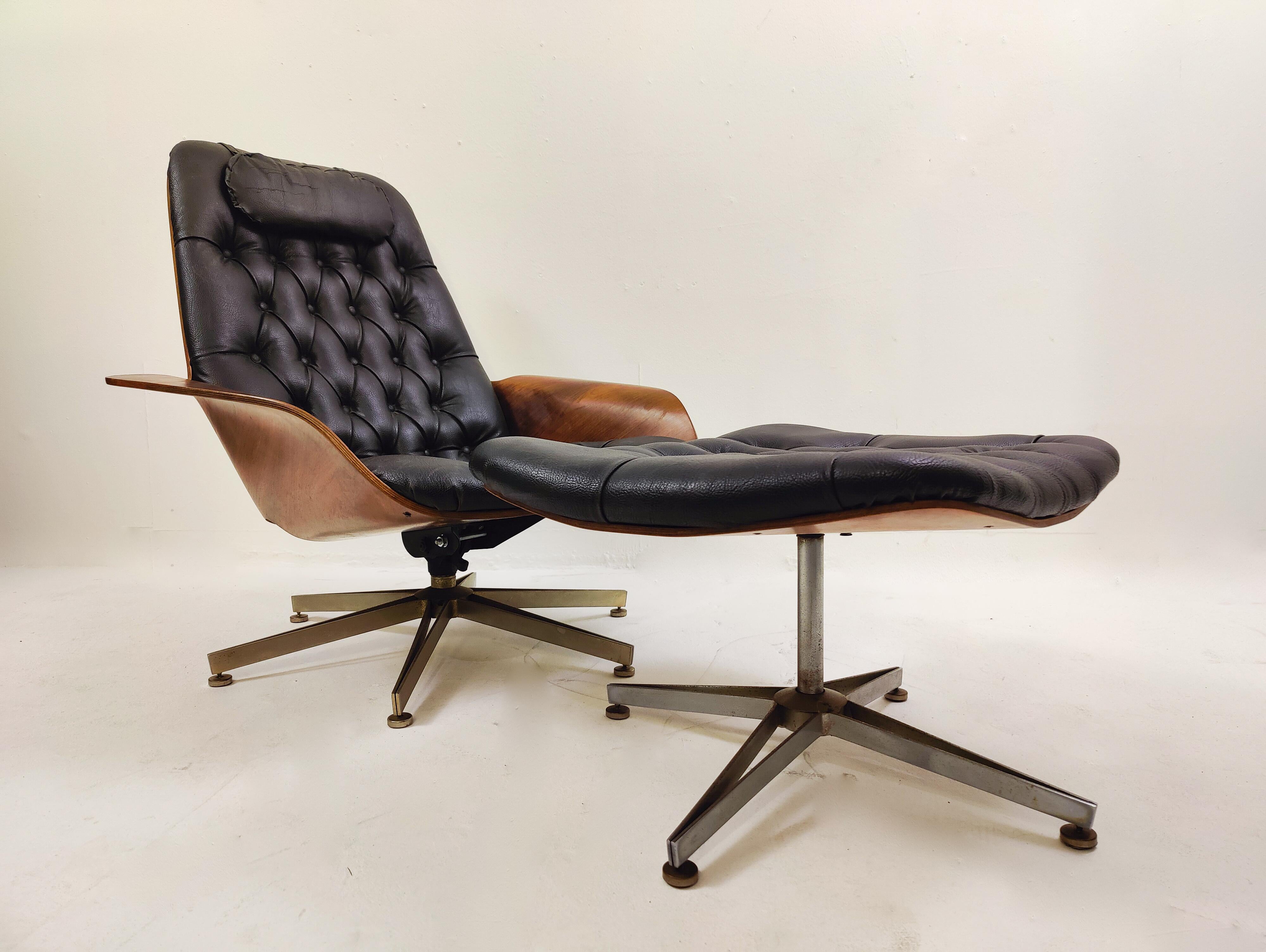 Mid-20th Century Swivel Black Leather Armchair, Plywood Armrests and Ottoman, George Mulhauser