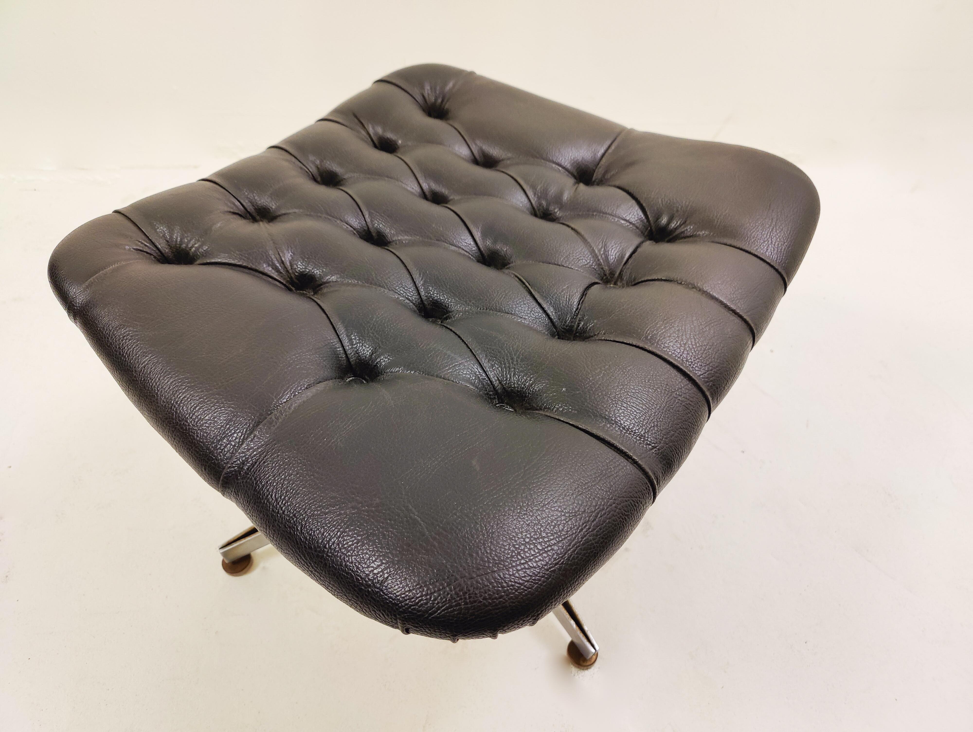 Swivel Black Leather Armchair, Plywood Armrests and Ottoman, George Mulhauser 1