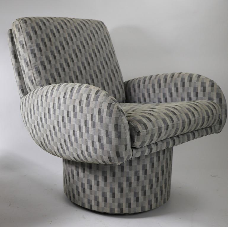 North American Swivel Chair and Ottoman after Milo Baughman by Classic Gallery Inc.