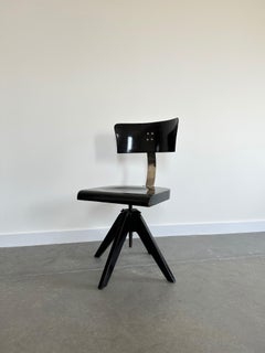 Swivel chair by Lajos Kozma