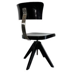 Swivel chair by Lajos Kozma