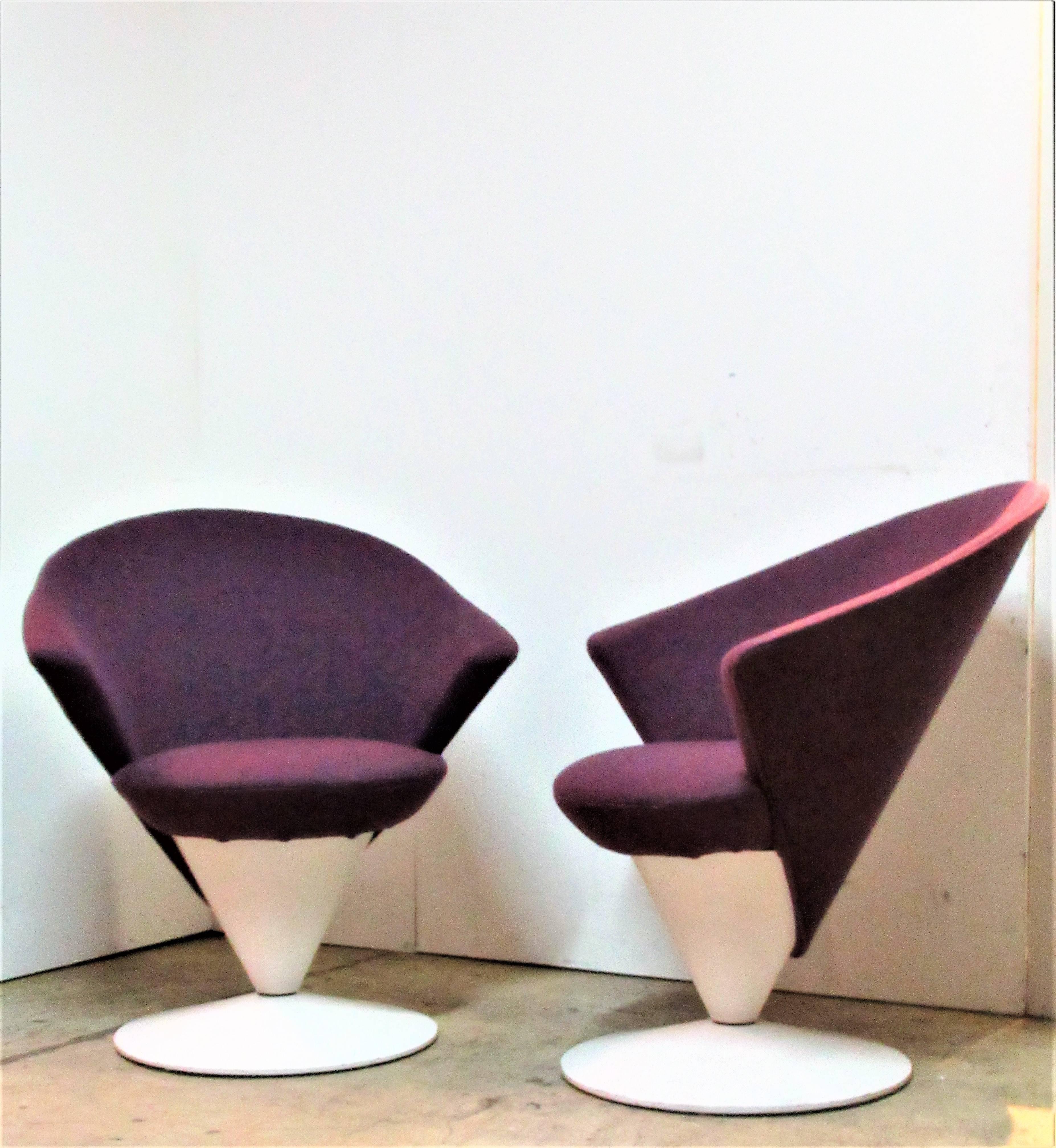 Pair of swivel cone chairs by Adrian Pearsall for Craft Associates, circa 1960s. These were reupholstered some time ago in a beautiful Knoll style quality woven purple fabric that works perfectly with the futuristic design of these chairs.