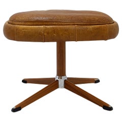 Swivel footrest in brown leather with metal base - De Sede, Switzerland.