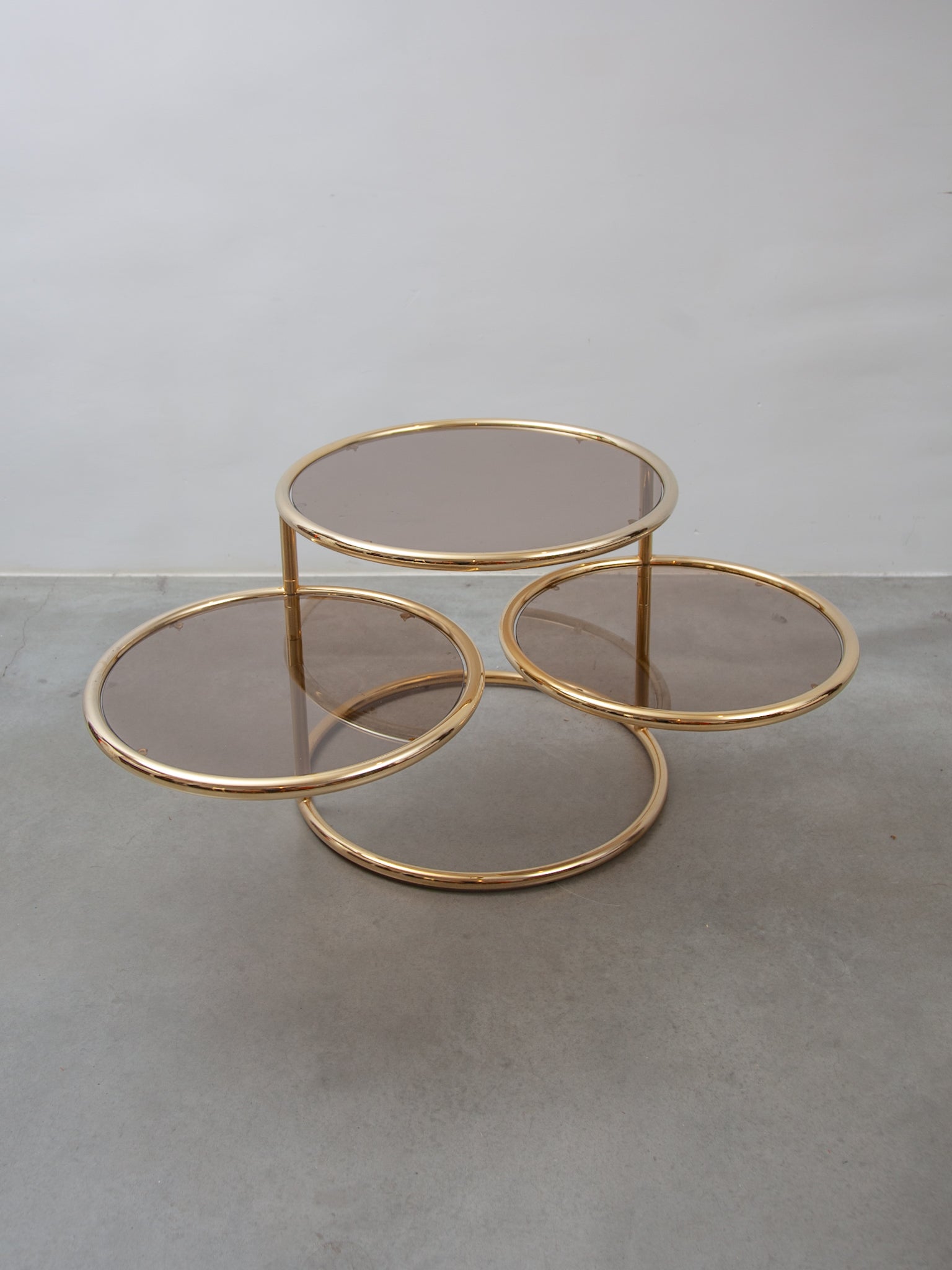 Italian Swivel Glass, Brass Round Coffee Table by Milo Baughman for Morex, Italy, 1970s