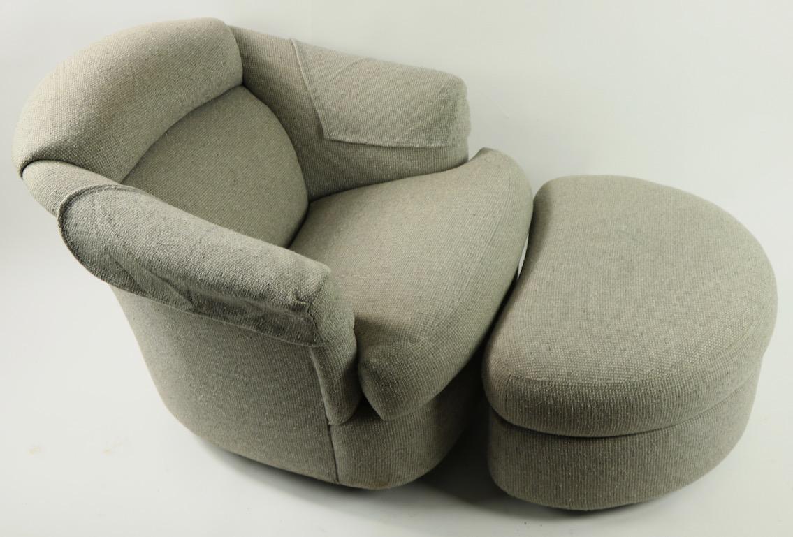 Nice grey tweed upholstery comfy lounge chair with matching ottoman. The pieces are in clean and ready to use condition.
Dimensions of ottoman :
29 W x 20 D 22 H 
Total D of chair with ottoman 56 inches.
Great design, quality workmanship and