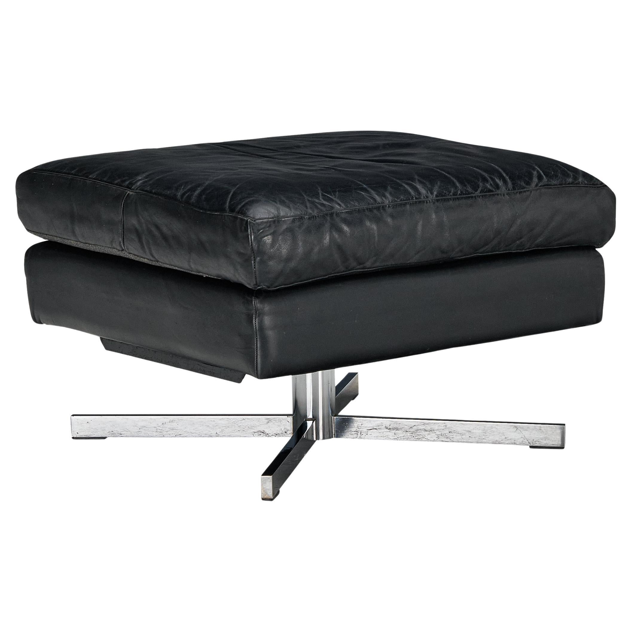 Swivel Ottoman in Black Leather and Steel Base 