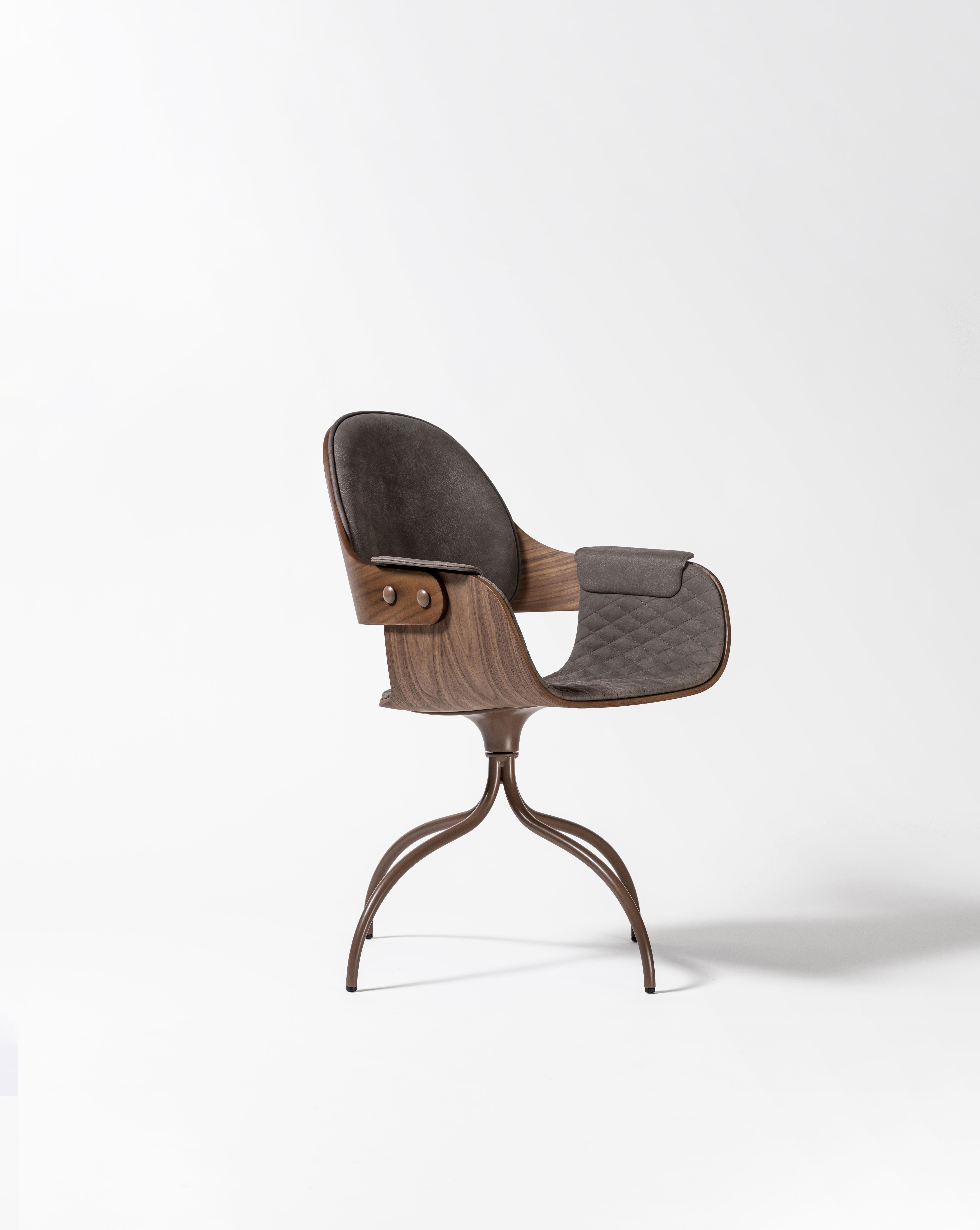 Swivel showtime chair by Jaime Hayon 
Dimensions: D 65 x W 55 x H 86 cm 
Materials: Powder coated steel or aluminium structure. Legs, seat and backrest in plywood with exteriors in natural ash, walnut or ash stained black. Metallic decorative