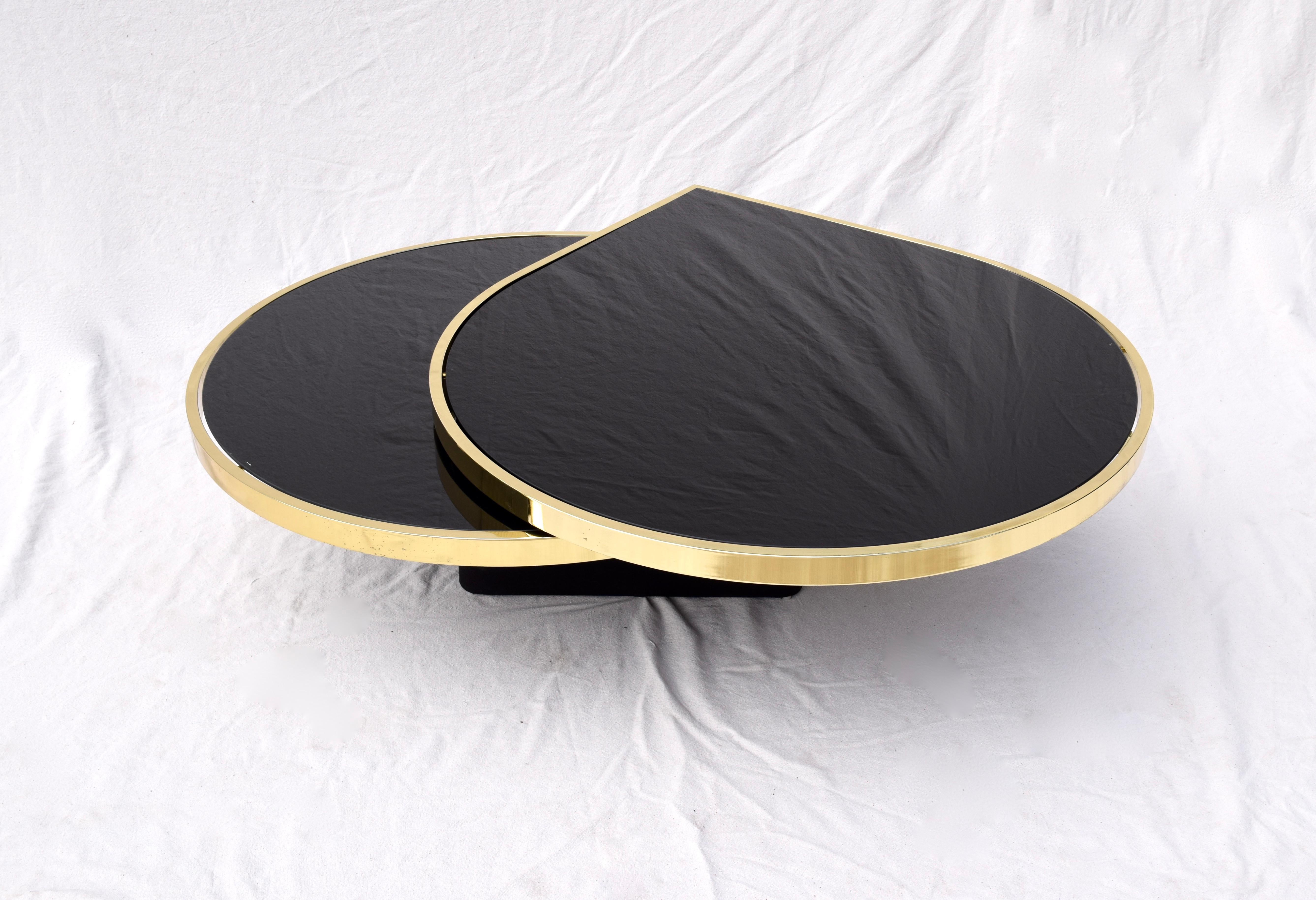Late 20th Century Swivel Brass & Black Glass Cocktail Table by Design Institute of America