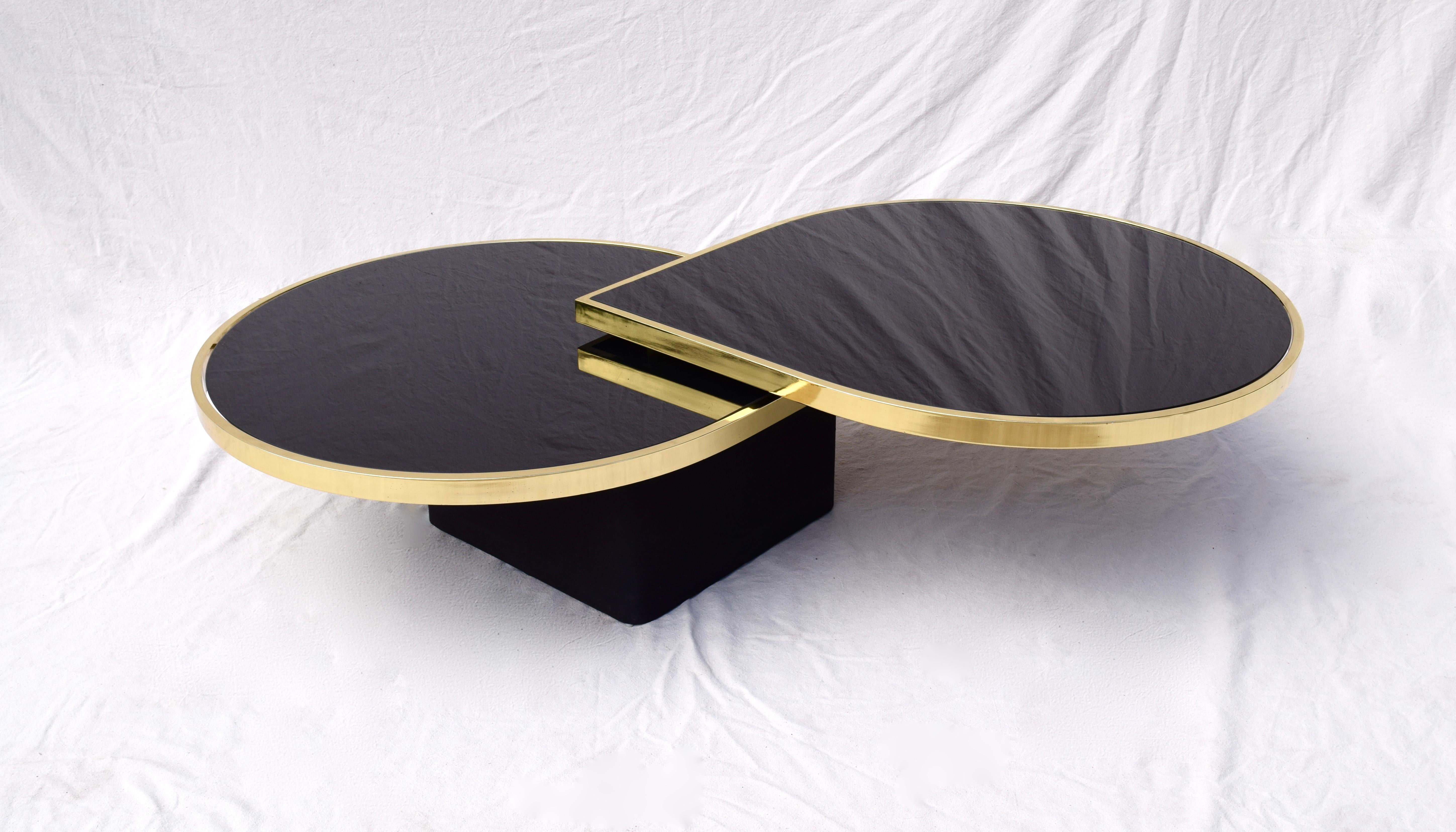 American Swivel Brass & Black Glass Cocktail Table by Design Institute of America