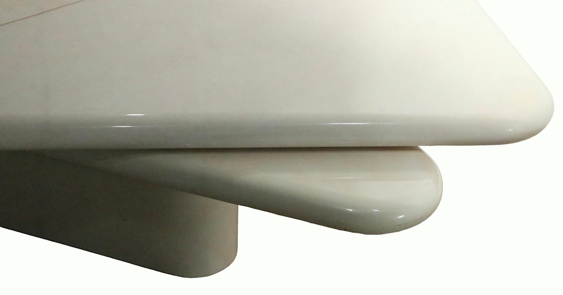 Exceptional Post Modern, Hollywood Regency style coffee table in high gloss lacquer finish. The table features a folding top, which is triangular when closed, and square when opened. The top swivels ( see video ), just to make this piece even
