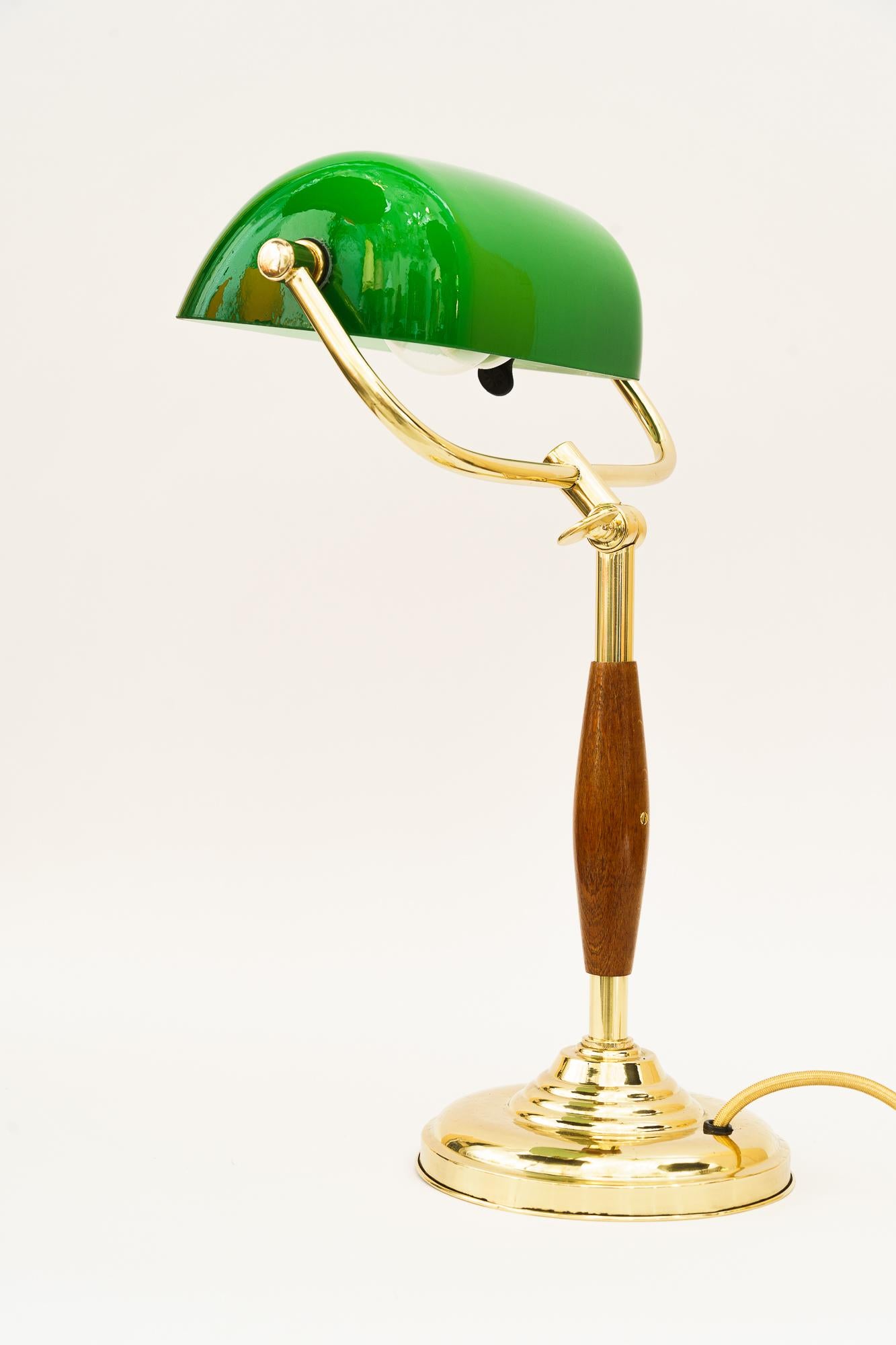 Brass Swiveling and adjustable art deco banker table lamp vienna around 1920s For Sale