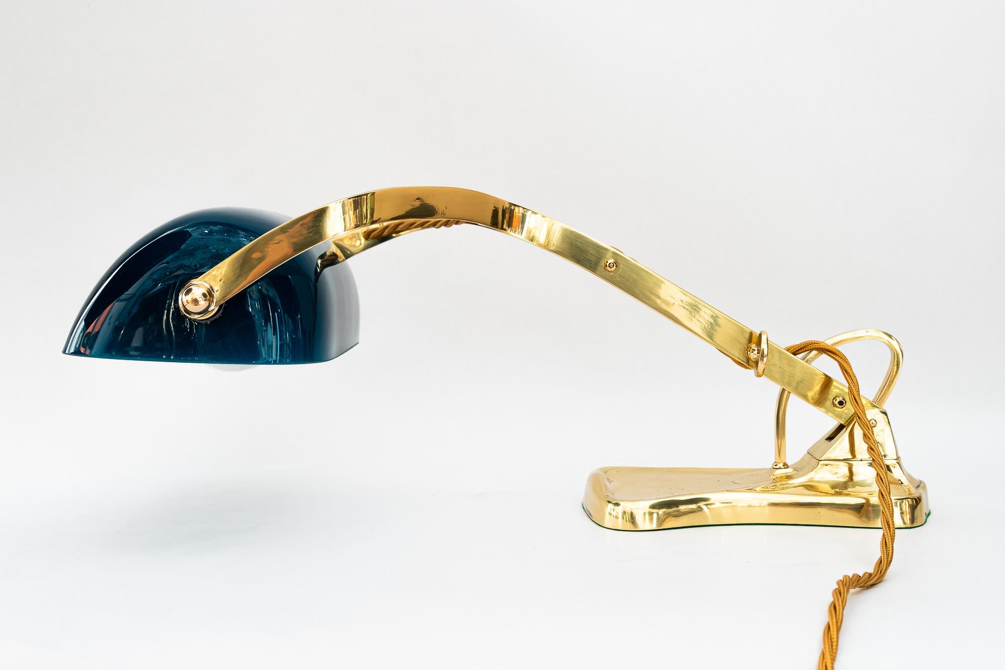 Brass Swiveling Art Deco banker table lamp with glass shade around 1920s For Sale