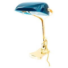 Swiveling Art Deco banker table lamp with glass shade around 1920s