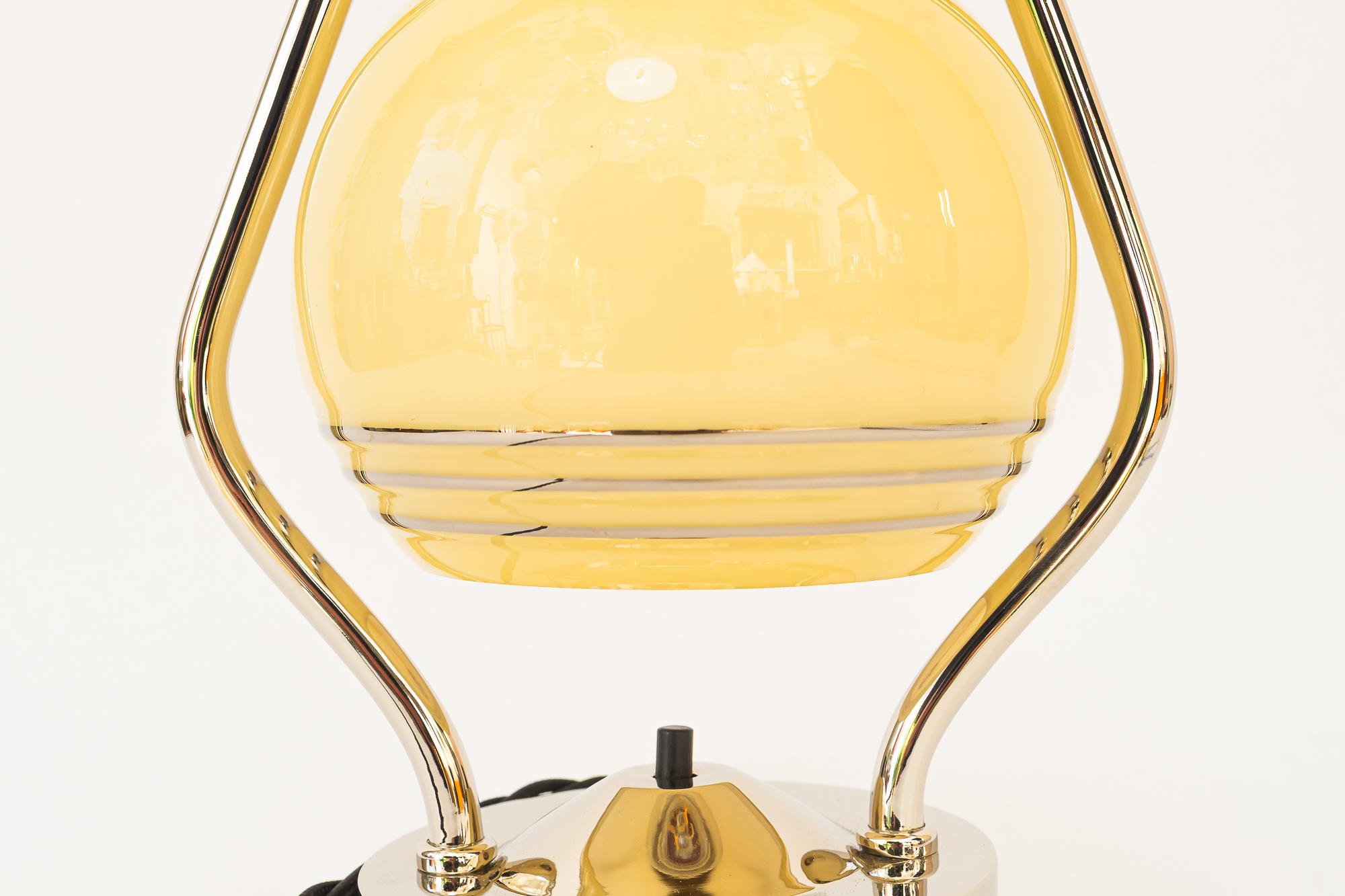 Austrian Swiveling Art Deco nickel table lamp with glass vienna around 1920s For Sale