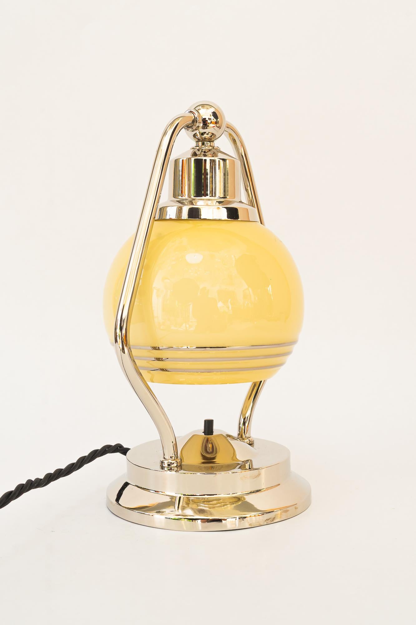 Early 20th Century Swiveling Art Deco nickel table lamp with glass vienna around 1920s For Sale