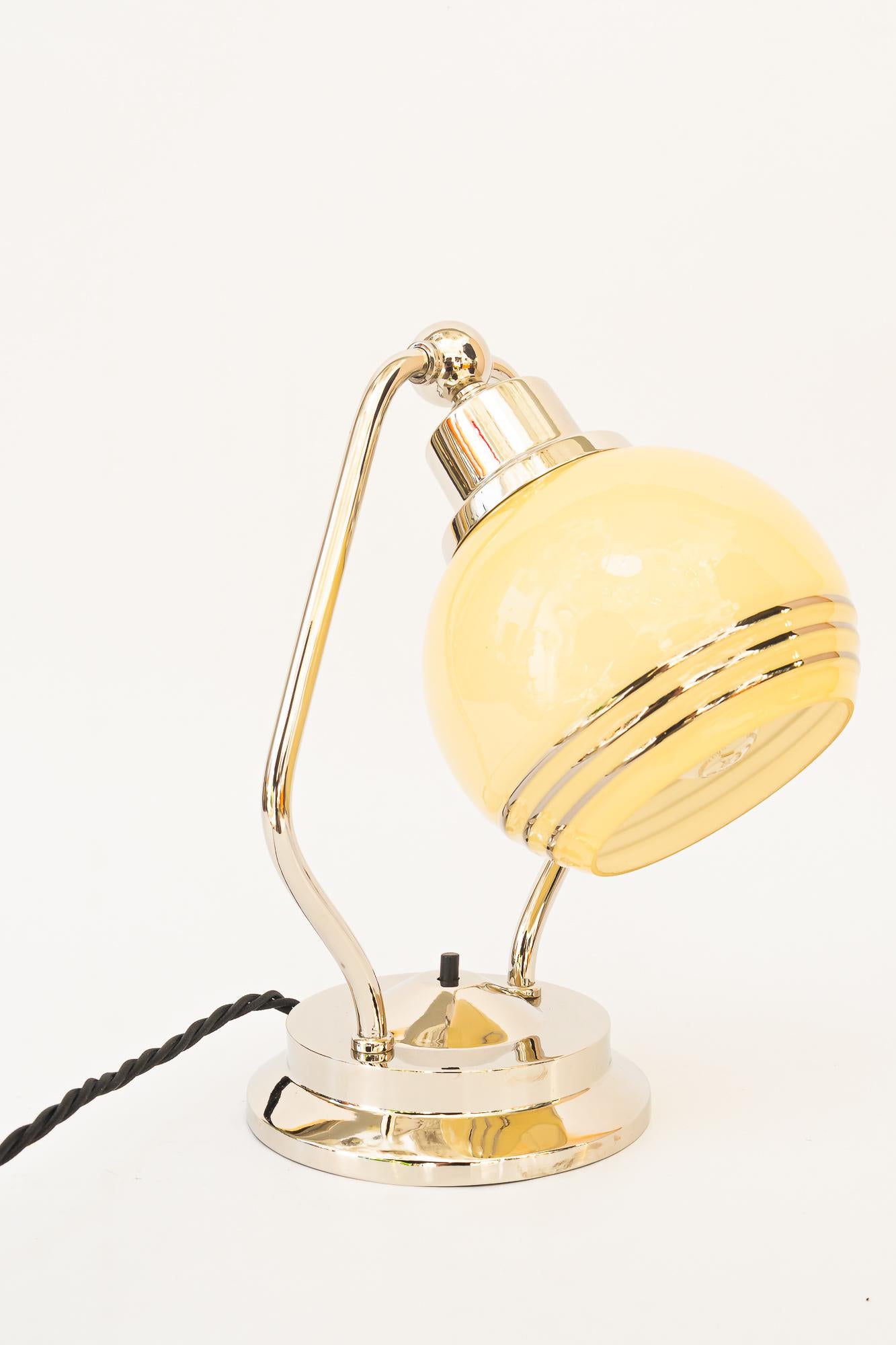 Glass Swiveling Art Deco nickel table lamp with glass vienna around 1920s For Sale