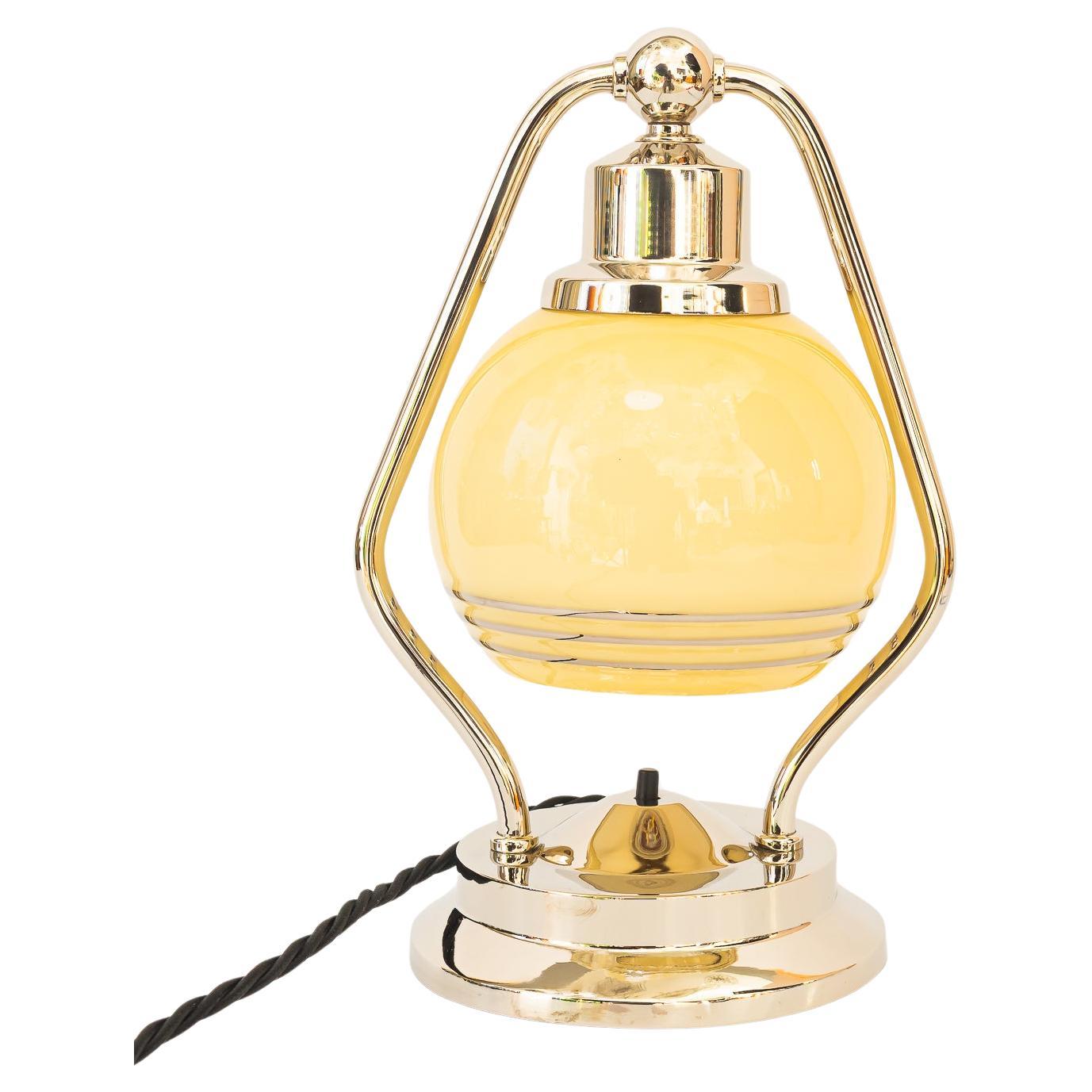Swiveling Art Deco nickel table lamp with glass vienna around 1920s For Sale