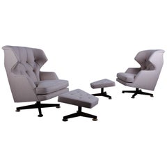 Swiveling "Janus" Lounge Chairs and Ottomans by Edward Wormley for Dunbar