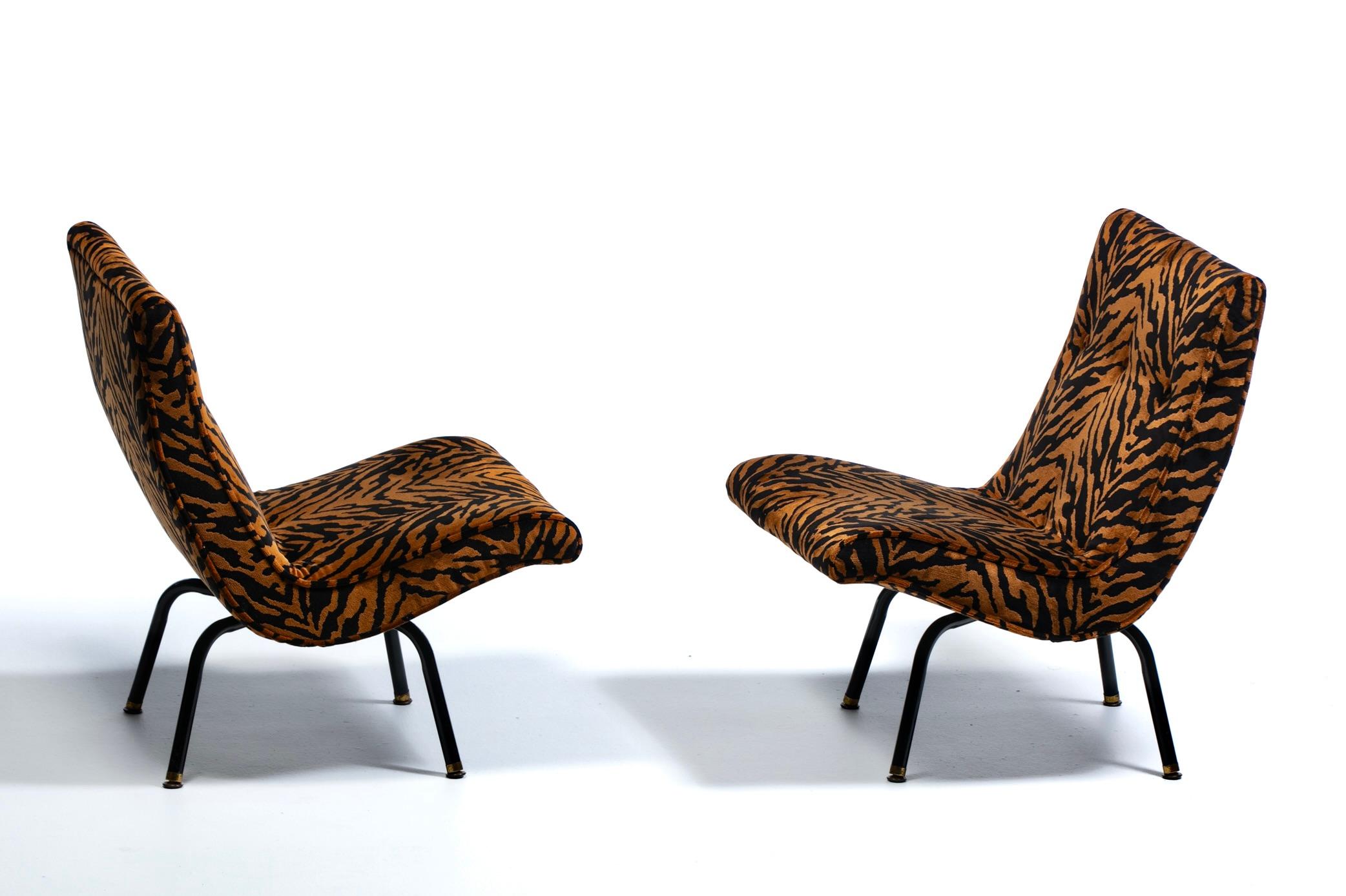 Milo Baughman style mid century modern swiveling scoop chairs newly upholstered in supple and shimmering black tiger velvet. Perhaps one of the most recognized chair designs to come out of the Mid Century Modern Era, the scoop chair is pure mid