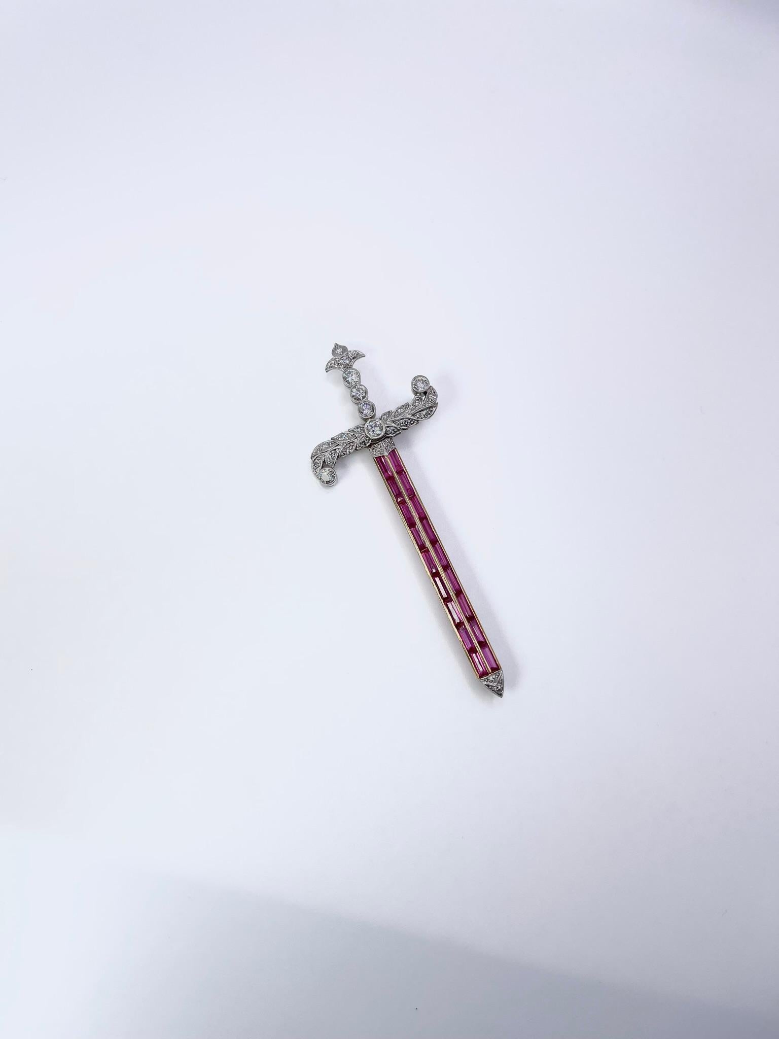 Rare sword made in platinum and 18KT gold with synthetic rubies and natural old diamonds. An artistic piece with excellent craftsmanship, year is uknown.
GRAM WEIGHT: 11.90gr
GOLD: 18KT yellow gold and platinum
SIZE: 2.5 inches long
NATURAL