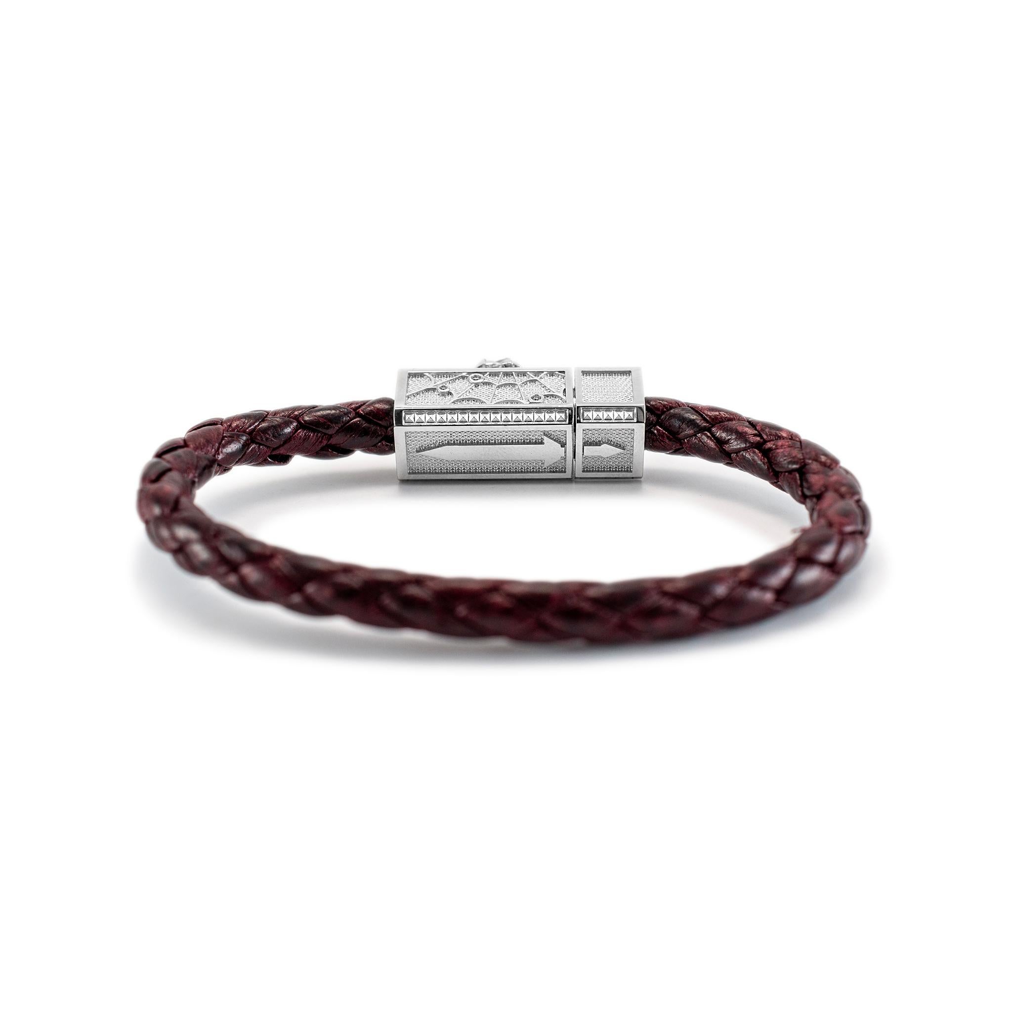 Brand: Sword Limited

Gender: Unisex

Metal Type: 18K White Gold & Titanium

Length: 6.00 inches 

Width: 10.35 mm

Weight: 25.75 Grams

18K white gold and titanium diamond bracelet. The metals were tested and determined to be 18K white gold and