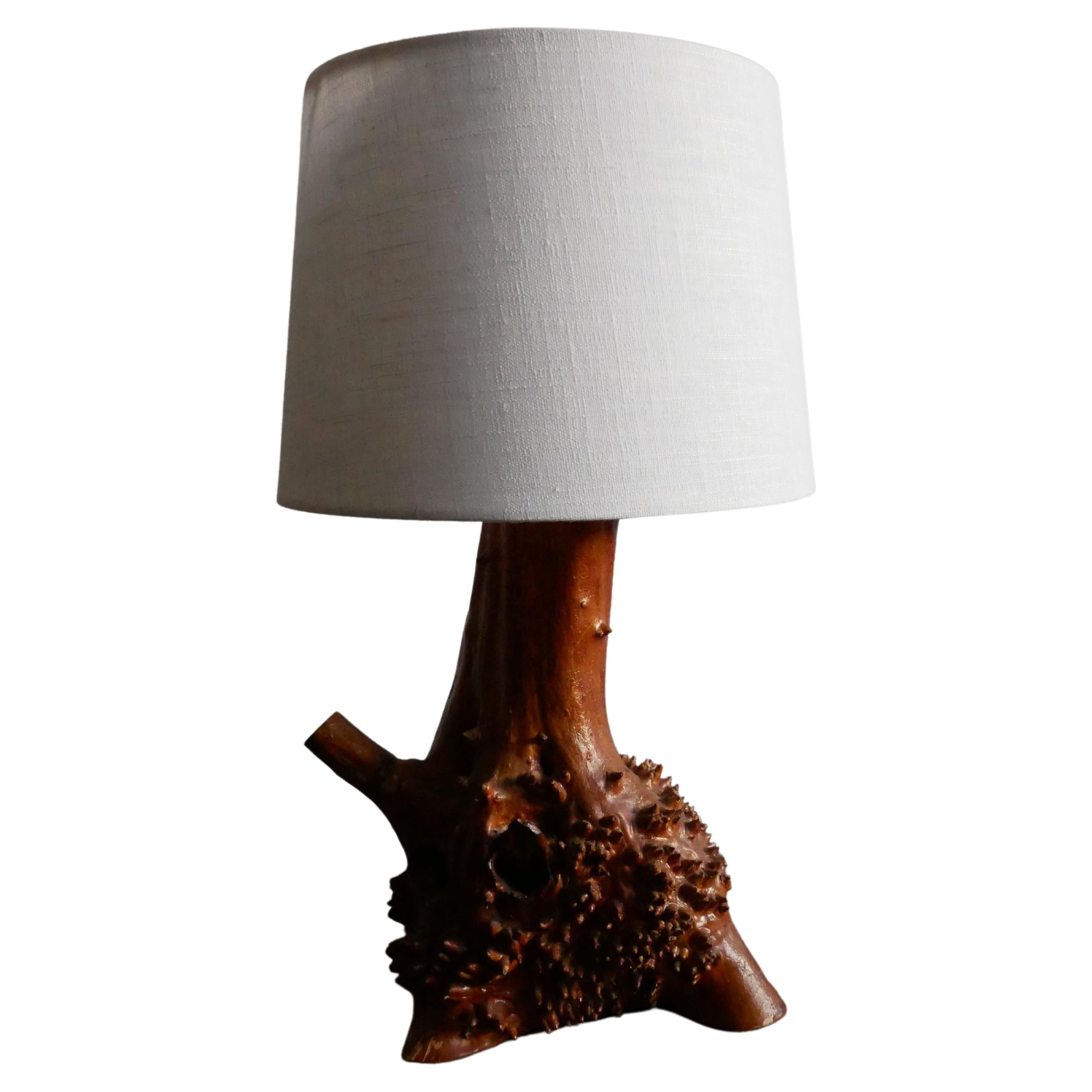 Organic wabi-sabi burl wood taple lamp, circa 1960.

The organic and textual appearance of this lamp is in its own Scandinavian way, something that you can look at many different times and still see something new. The way the wood turns and twist