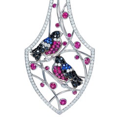 Sybarite Bird Earrings in White Gold with White Diamonds, Rubies & Sapphires