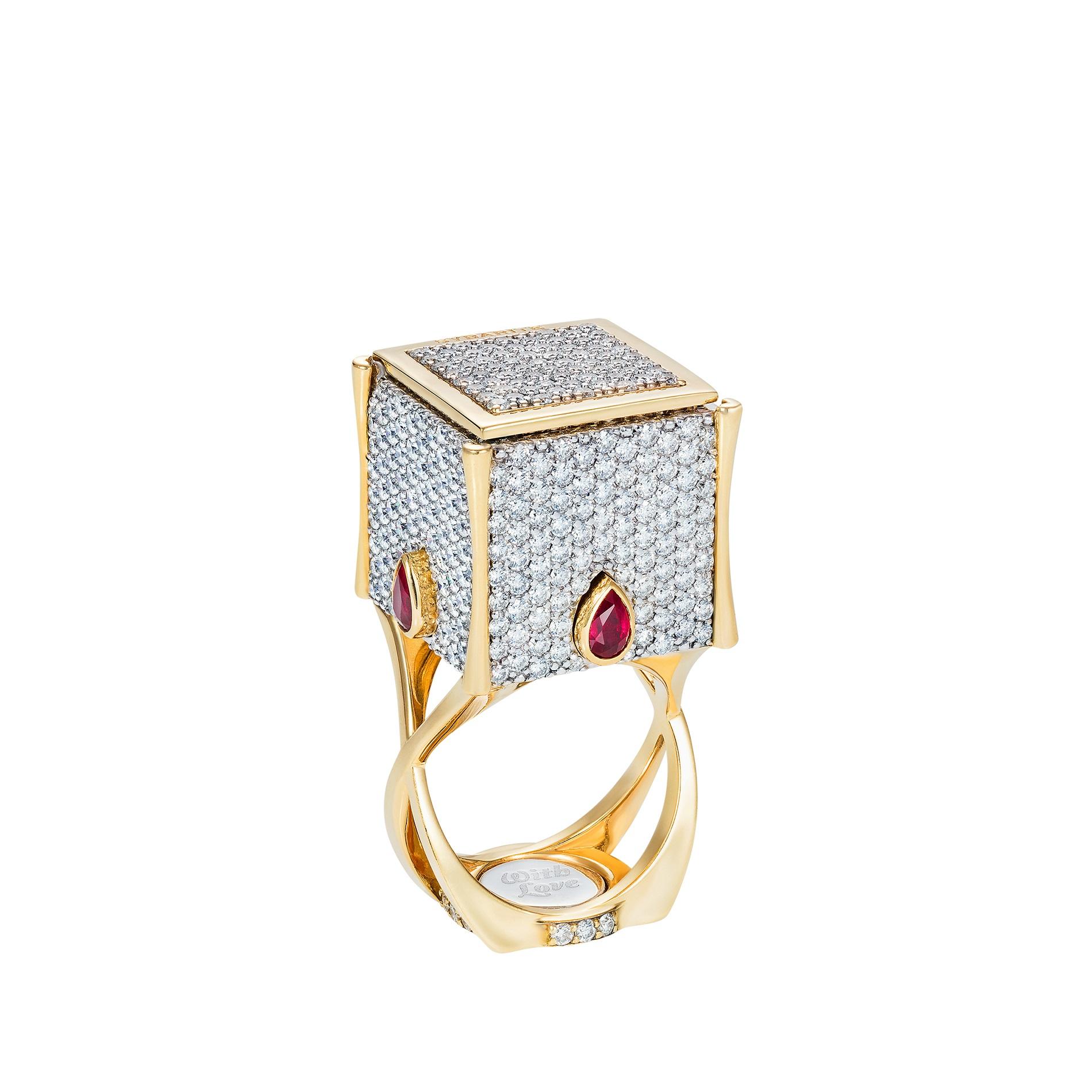 The Sybarite—defined as one who is self-indulgent in their fondness for sensuous luxury—seeks extravagance and excellence in equal measure.
This playful cocktail ring is an amazing piece of jewellery art. 
Press the secret button and discover the