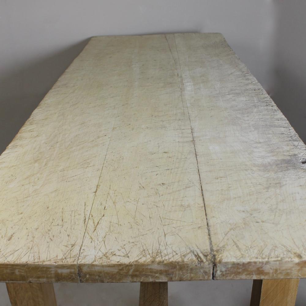 A large early to mid-20th century, oak and sycamore, kitchen preparation table. The top a beautifully weathered, pale and worn scrubbed sycamore, the base, peg constructed solid oak.

This came from a historic traditional independent pork pie