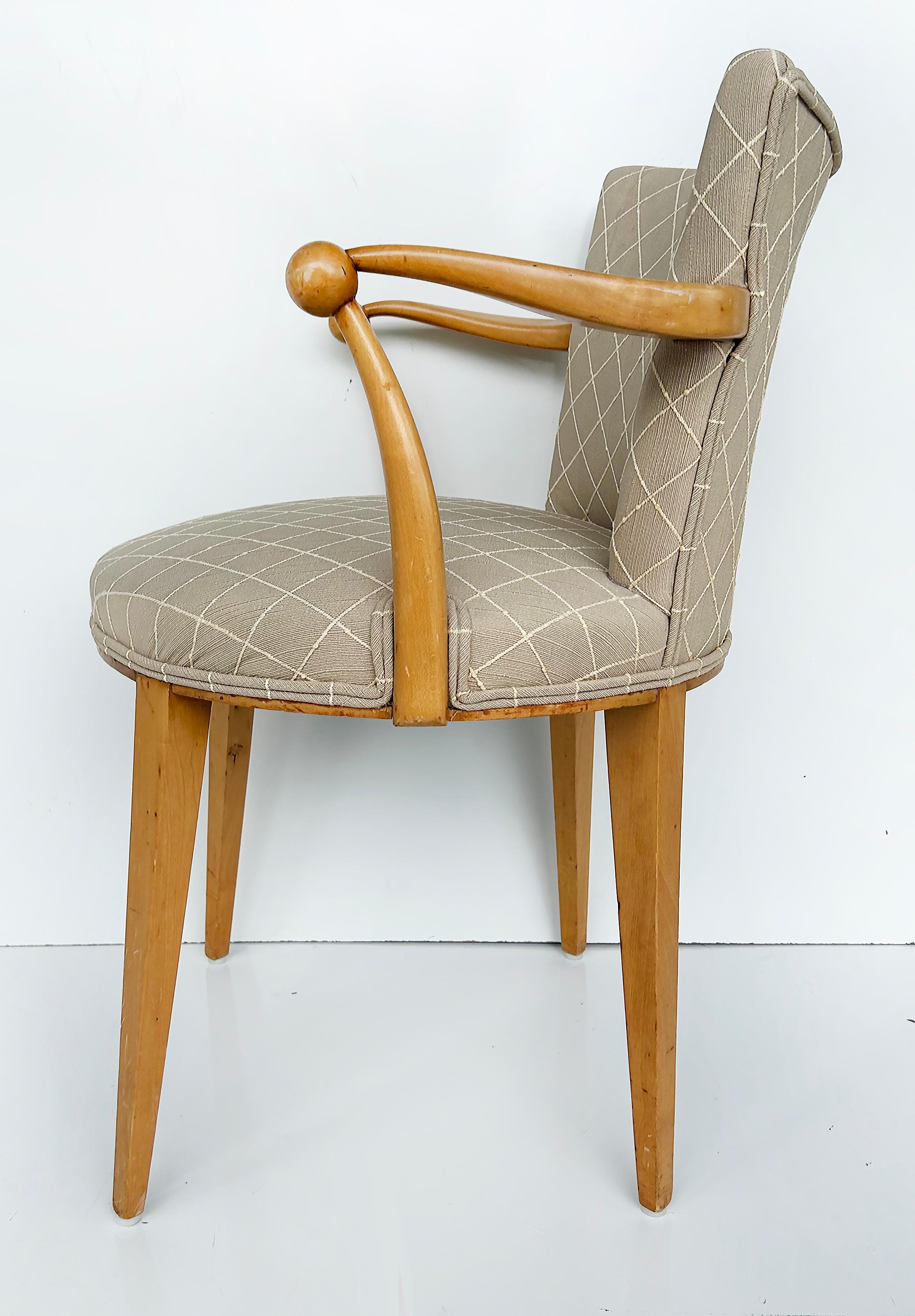 Sycamore Wood Upholstered Vanity or Desk Chair with Stylized Wood Arms and Legs

Offered for sale is an unusual stylized vintage Sycamore wood chair with curved arms that have decorative sphere details. The chair is upholstered in a subtle large