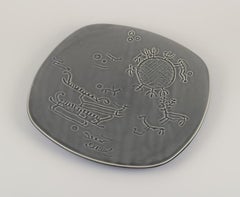 Syco, Swedish ceramic workshop. Decorative plate, motf of Tanum rock carvings