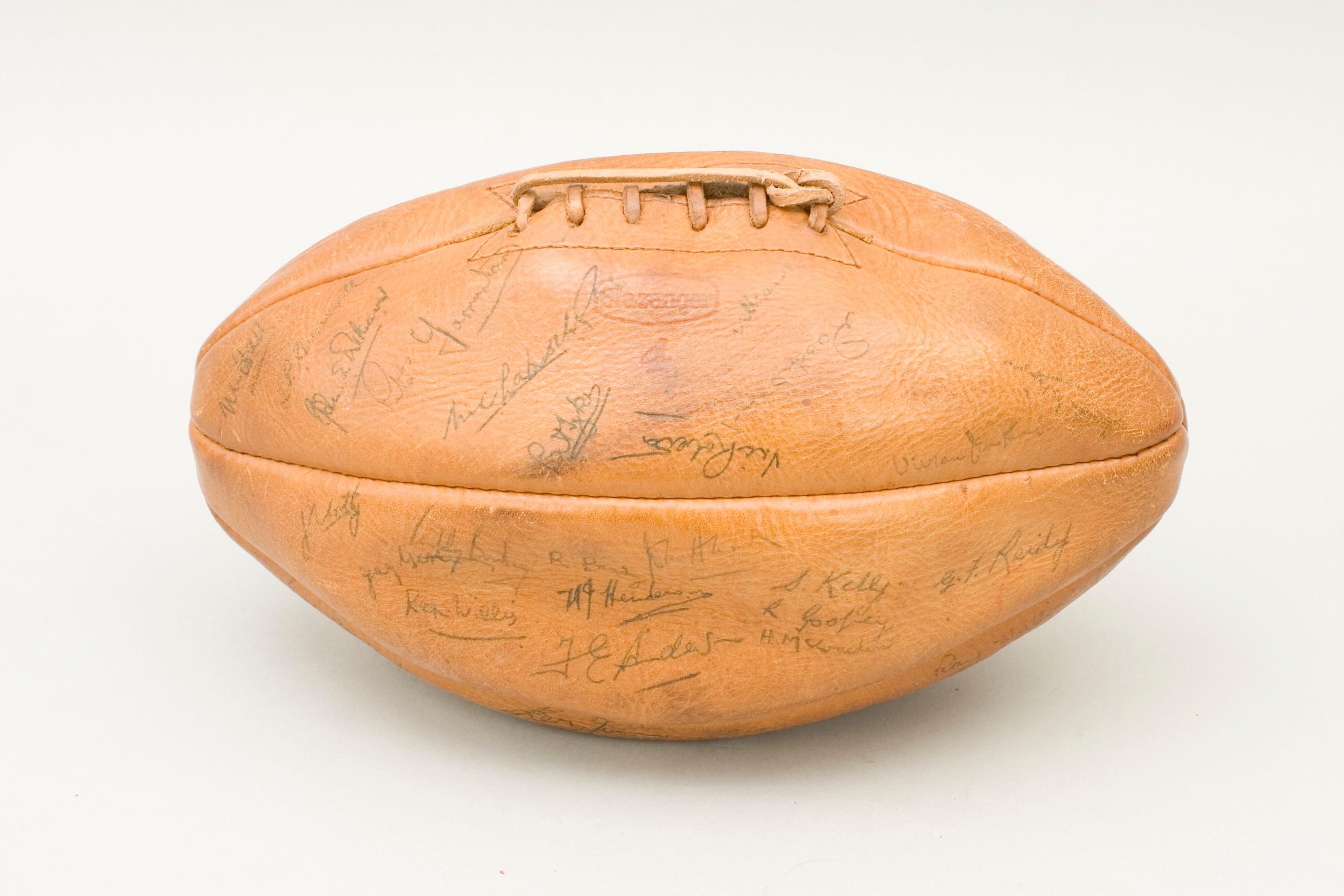 Signed Sykes perfection rugby ball, 1954 Five Nations.
A great looking traditional leather rugby ball marked Slazenger, Sykes Perfection. The ball with a lace-up slit to the top and made from six leather panels. The ball is with good color and is