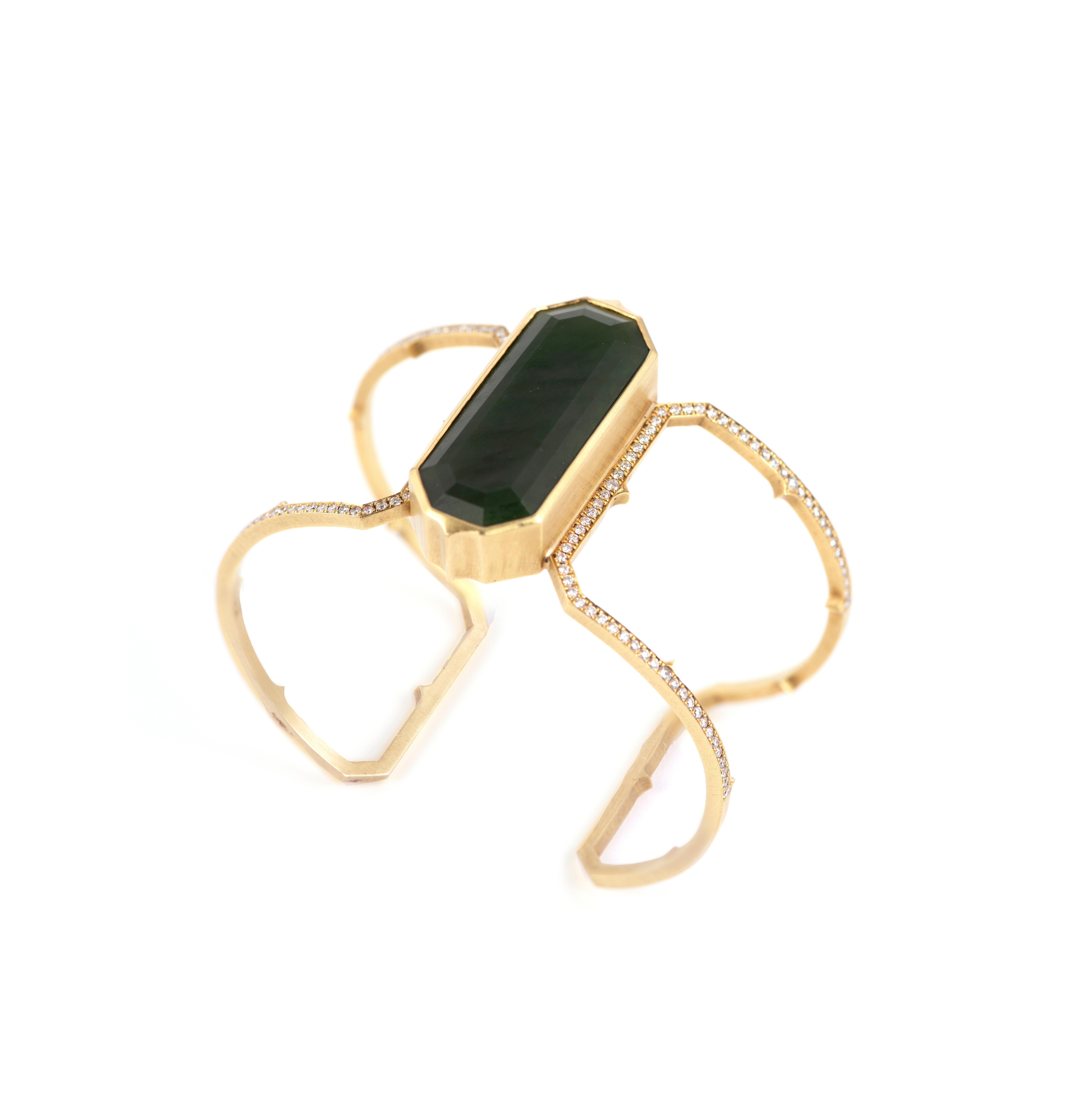 Delicate yet tough, this elegant bracelet holds a strong presence on the wrist. Deep and mysterious Nephrite Jade is paired with a dainty diamond pave set down the sides of this architectural cuff.  Also find Sylva & Cie signature thorn motifs,