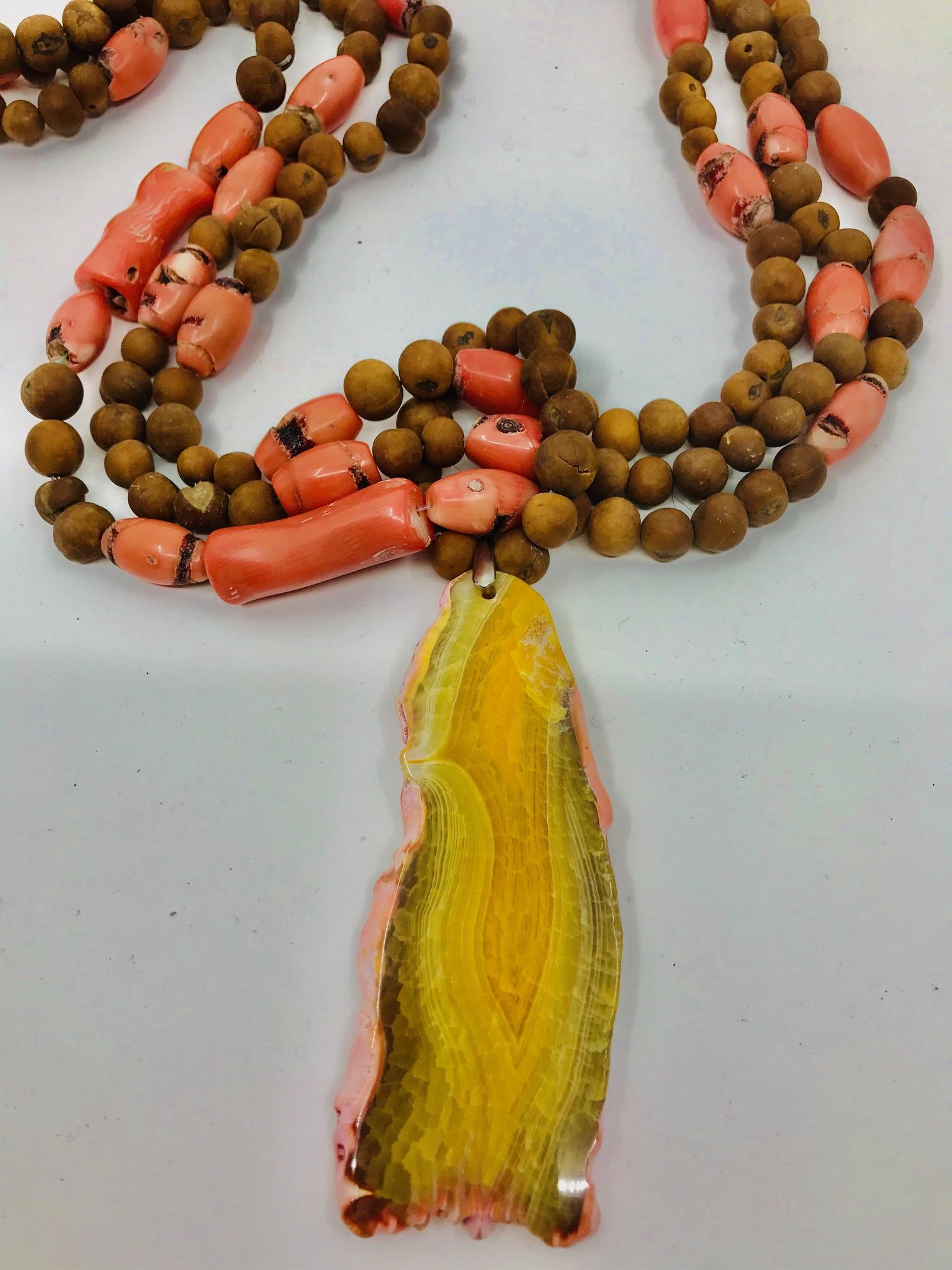 Contemporary Sylvia Gottwald, Coral, salmon color and wooden beads multi strand , Necklace. For Sale