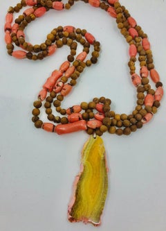 Sylvia Gottwald, Coral, salmon color and wooden beads multi strand , Necklace.