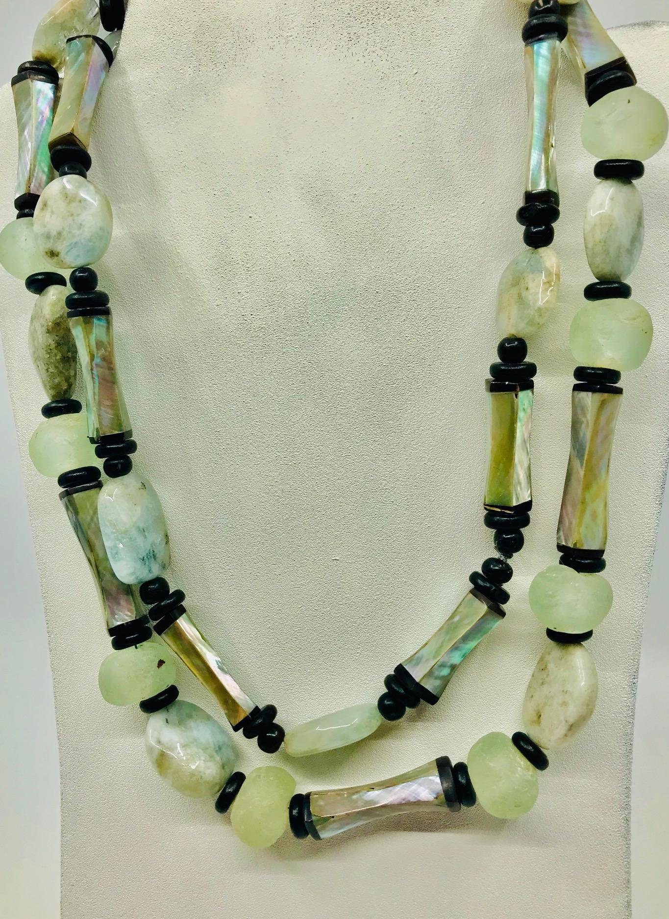  Long Haliotis /Abalone and Glass beads Statement Necklace. The exceptional high quality Abalone beads with black Horn ends were produced during French Deco period.In this necklace they are combined with African glass beads and small round wooden