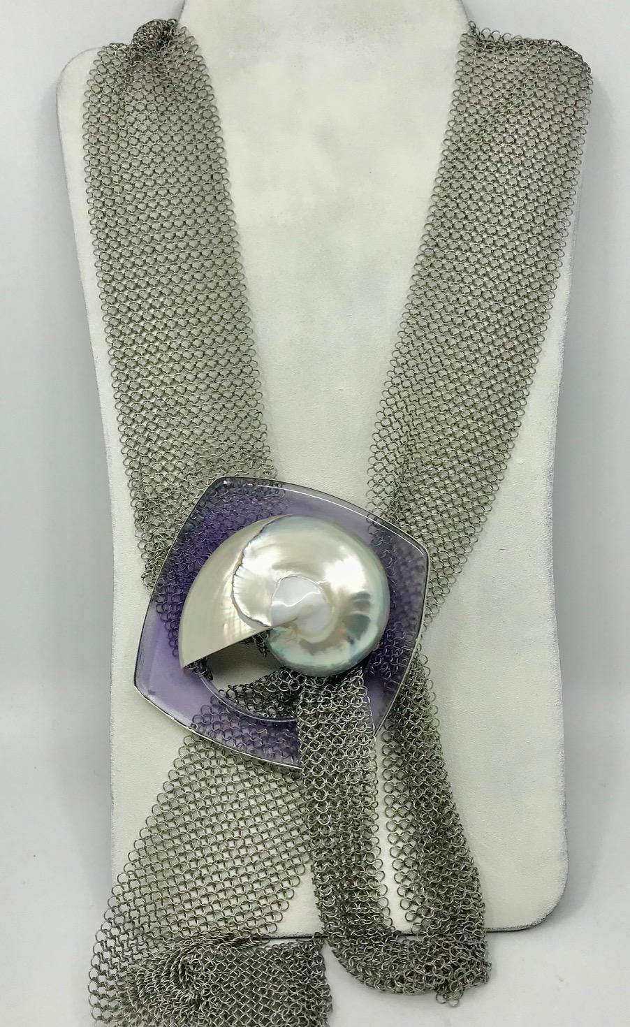  Nautilus Pendant on Stainless Steel chain mail could be worn as a Necklace or as a Belt. The Pendant / Buckle consists of Nautilus shell on purple Resin in Silver frame. All S.Gottwald creations are one of a kind ,hand made , contemporary and eco