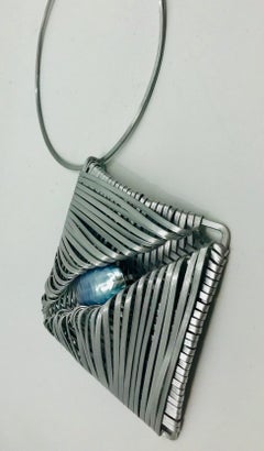 Sylvia Gottwald, Osmena , Nautilus Pearl, Pendant in Aluminum wire cage/