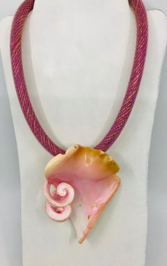 Sylvia Gottwald, Pink Conch Pendant on Chocker Necklace.