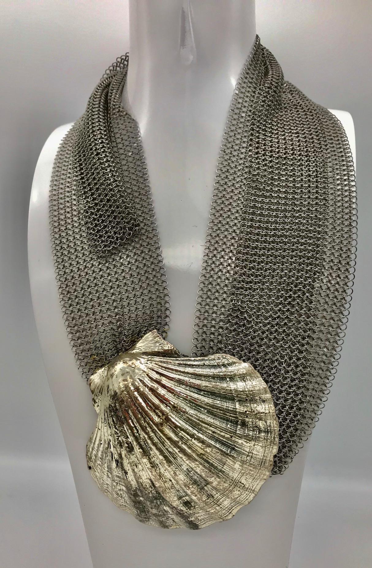 Silvered Shell Buckle on Stainless Steel Mesh Belt, can be worn as a Belt or as a Necklace. This piece is unique it was silvered in Rome and worn on a Fashion Show. 
Sylvia Gottwald's creation's are all one of a kind and hand made ,this particular