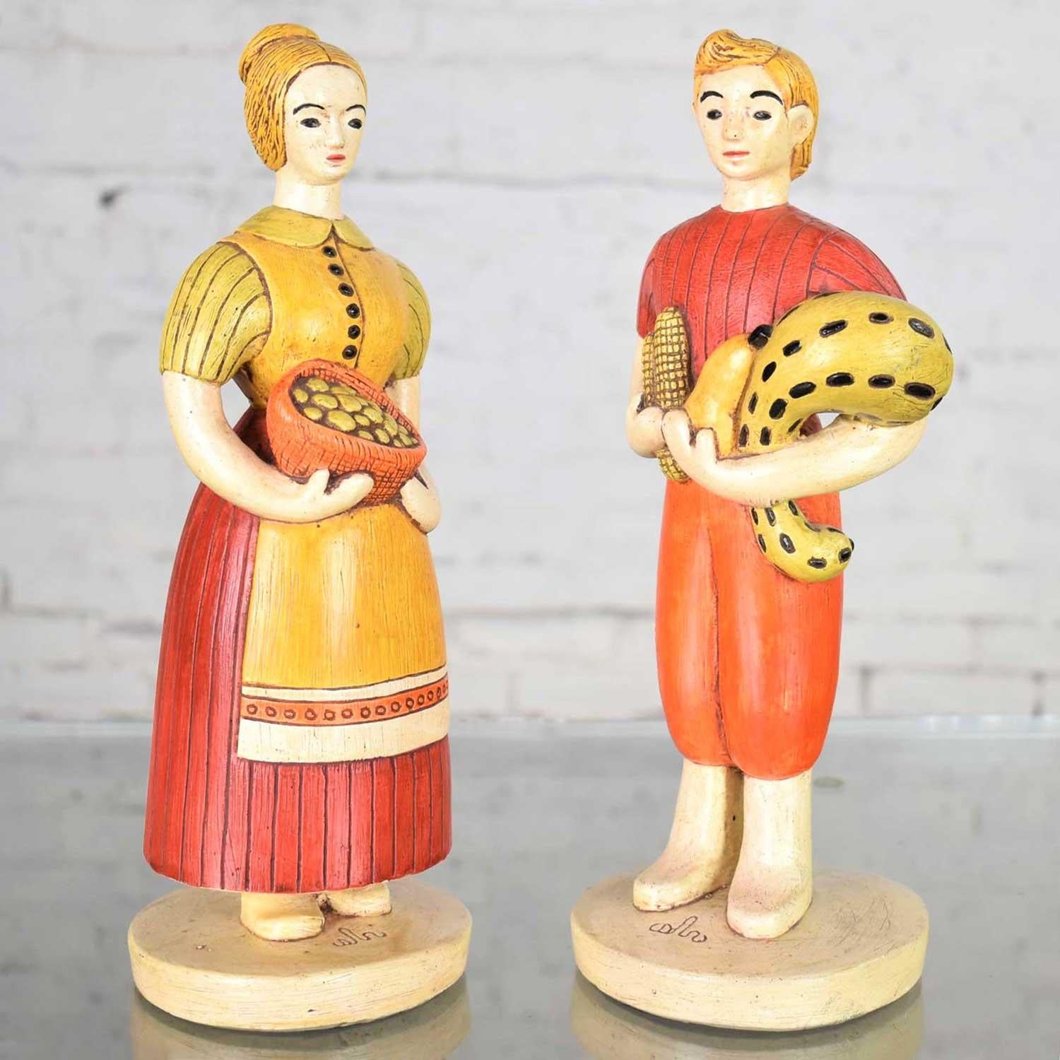 Sylvia Hood original vintage harvest couple chalkware figurines one man and one woman. These Iconic figurines bear her logo indicating their rare authenticity. They are comprised of Extone (a material much like chalkware, invented by her husband